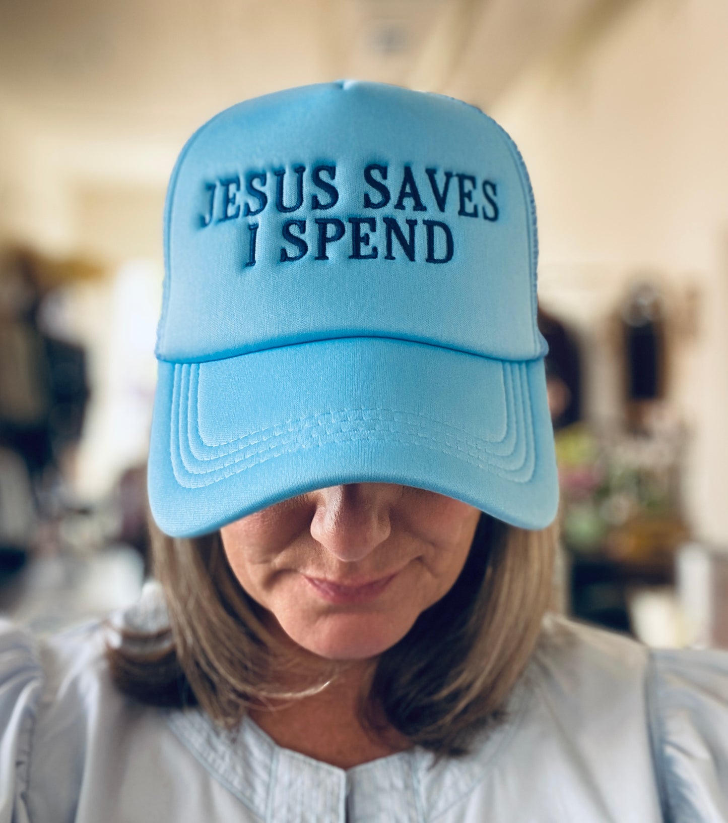 Jesus Saves I Spend Trucker Hat in Blue
